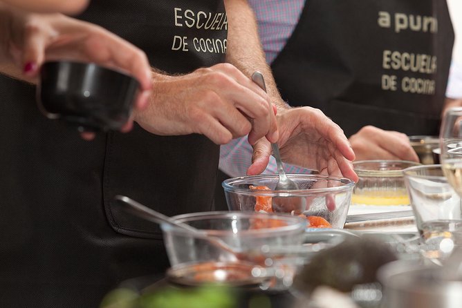 10 Tapas Cooking Class Experience in Madrid with Sangria - Cooking tapas at C. de la Farmacia