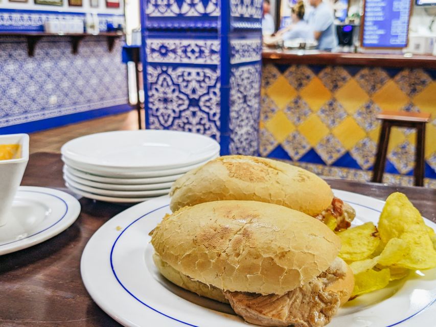 3-Hour Tapas Tour in Triana, Sevilla's Vibrant Neighborhood - Crossing the Isabel II Bridge