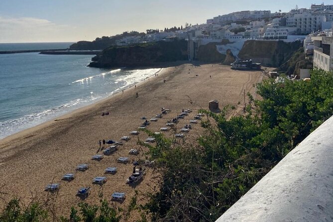 Albufeira History Walking Tour with Wine and Tapas - Walking through Centro Histórico de Albufeira