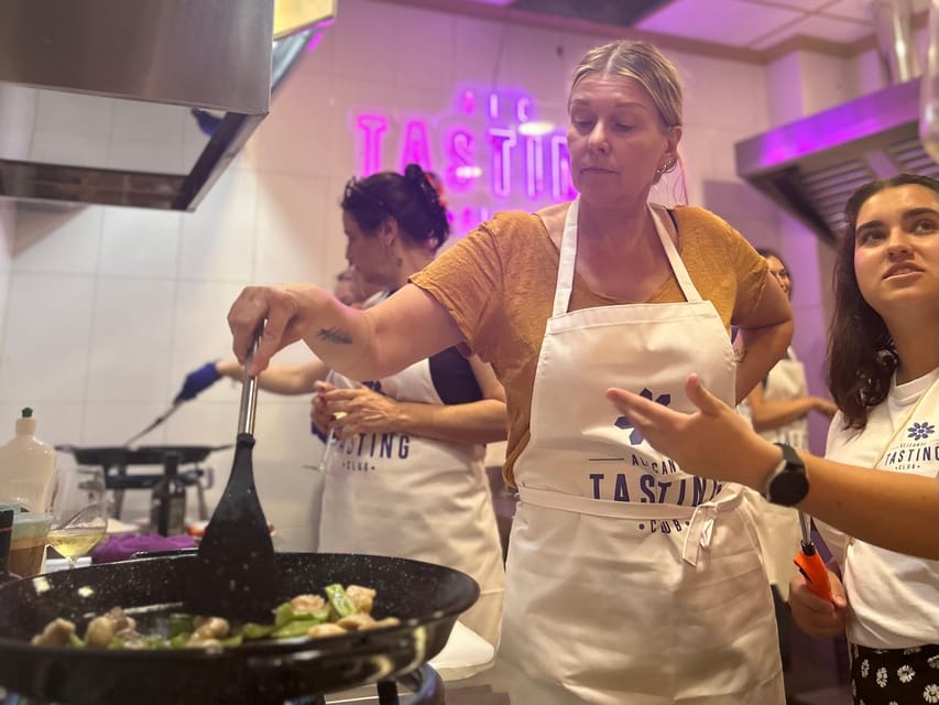 Alicante Paella Cooking Class, Tapas, Drinks and Market - Cooking Alicante rice with a local chef