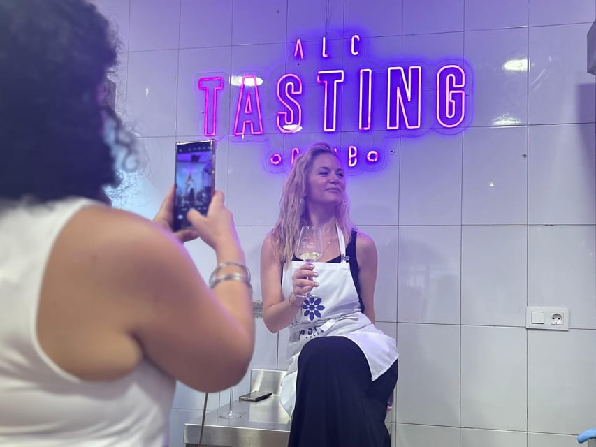 Alicante Paella Cooking Class, Tapas, Drinks and Market - Sitting down to eat what you made