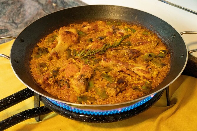 Any Day is Sunday: Paella Cooking Class with Tapas and Sangria - Cooking the paella, step by careful step