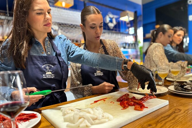 Authentic Paella in Madrid: A Hands-On Class with Tapas & Sangria - Tapas, olives, and drinks while the pan cooks