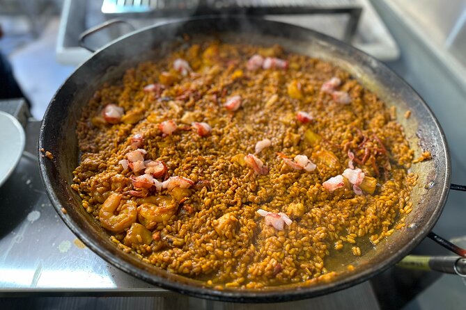 Authentic Paella in Madrid: A Hands-On Class with Tapas & Sangria - Timing, group size, and the social side