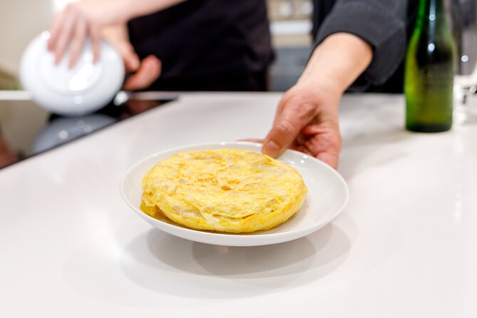 Authentic Tapas Cooking Class at a Private Local Eatery in Madrid - Meeting the Chef on Calle de Valderribas