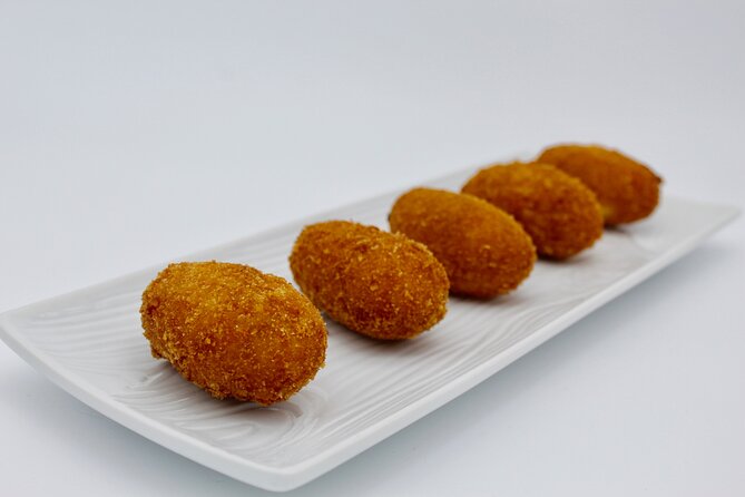 Authentic Tapas Cooking Class at a Private Local Eatery in Madrid - Eating Together With Wine