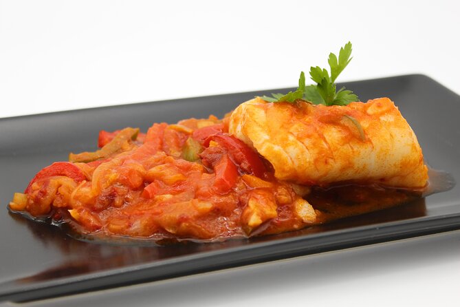 Authentic Tapas Cooking Class at a Private Local Eatery in Madrid - Black Ink Squid Paella as the Main Event