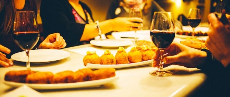 Barcelona: Evening Walking Tour in the Gaudi Area with Tapas - The historic bodega and Catalan flavors
