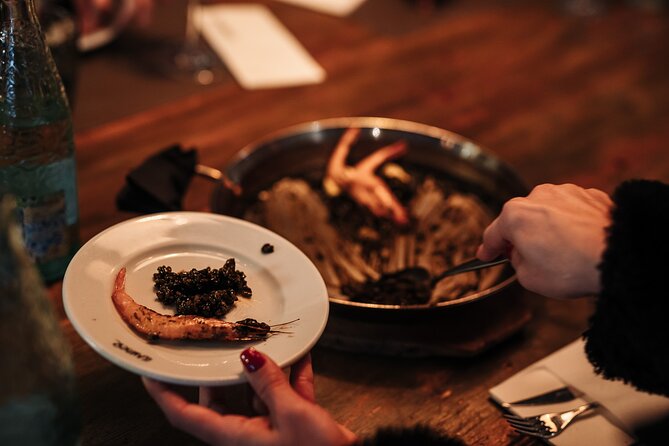 Barcelona: Guided Food Walking Tour with Tapas and Wine - Paella, cava, and dessert on Carrer d’Avinyó