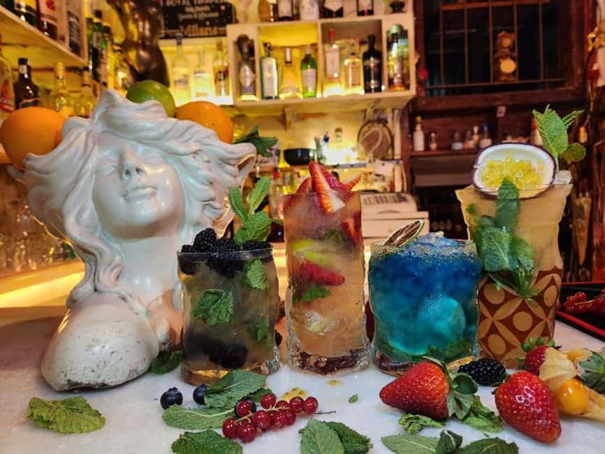Barcelona: Mojito Tasting Experience & Tapas with Mixologist - Entering Bar Milans in Barcelona’s Gótico district