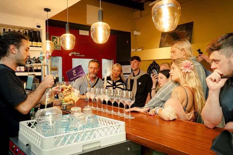 Barcelona: Old City Hidden Gems, Tapas, & Drinks Guided Tour - The porrón challenge adds a bit of chaos