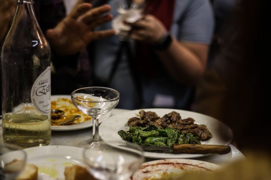Barcelona: Old Town Tapas & Paella Food Tour with 8 Tastings - Walking toward Barceloneta for paella and sangria