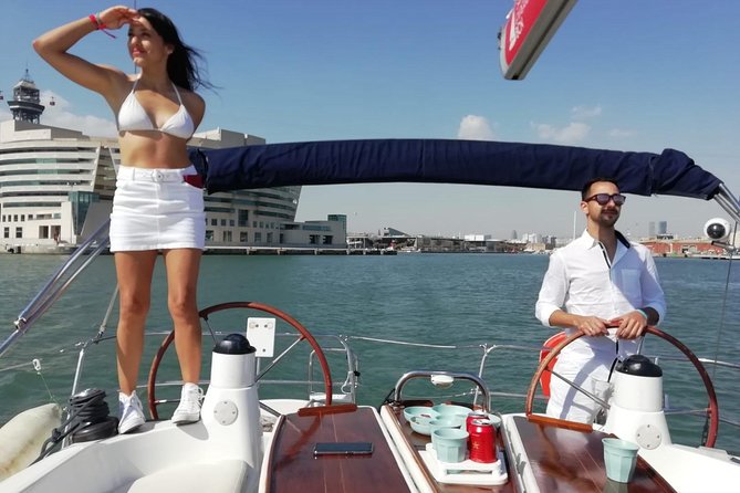 Barcelona Sailing Experience: Spanish Tapas and Premium Open Bar - Sunset sailing and departure-time choices