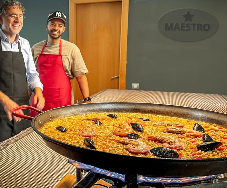 Barcelona: Seafood Paella ★Maestro★ & Tapas & Sangria - Learning the family-style seafood paella method