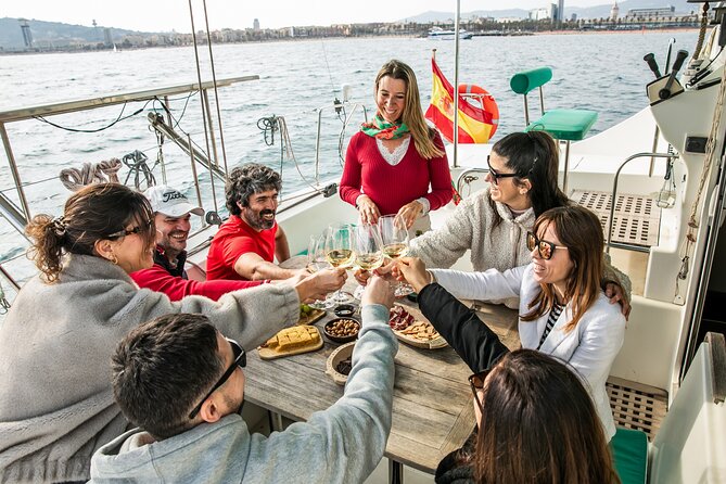 Barcelona Small Group Trip by Catamaran w Tapas, Cava and Sunset - Barcelona’s coastline from the deck