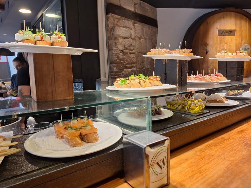 Barcelona: Tapas and Pintxos Tour with Crema Catalana - Key points to know before booking