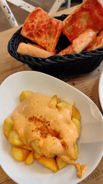 Barcelona: Tapas and Pintxos Tour with Crema Catalana - Vermut, cava, and the social side of eating