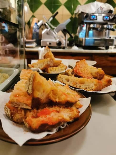 Barcelona: Tapas and Wine at the Hidden Bodegas Experience - Pintxos, anchovies, and regional character