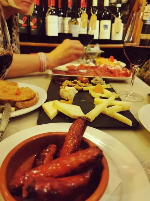 Barcelona: Tapas and Wine at the Hidden Bodegas Experience - Walking the Gothic Quarter with a local guide