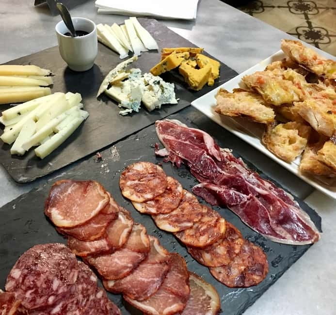 Barcelona Tapas Crawl food & drinks all included - The neighborhood classic and Catalan stew