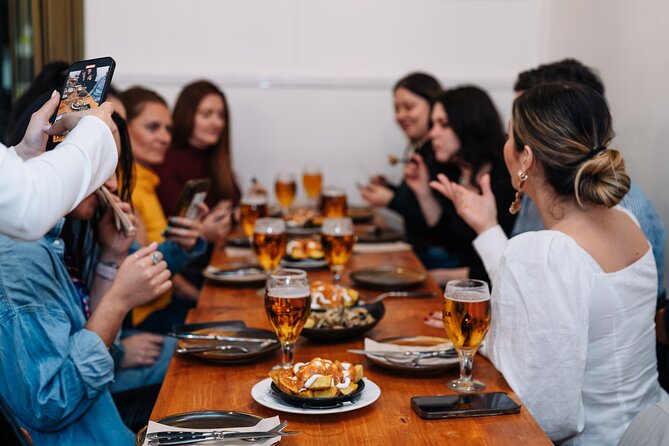 Barcelona Tapas Food Walking Tour with Wine in El Born - Choosing pinchos on Carrer de Montcada