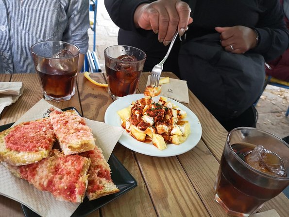 Barcelona Tapas & Wine Private Tour in Traditional Taverns - Stop three: beef, chickpeas, and Catalan red wine