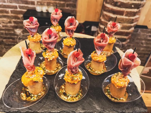 Barcelona Tapas & Wine Private Tour in Traditional Taverns - Stop four: cava in a traditional bar from 1912