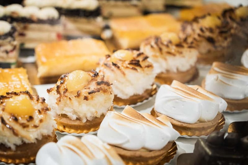 Barcelona: The Ultimate Local Tapas & Drinks Food Tour - Fried anchovies, tortilla, and montaditos