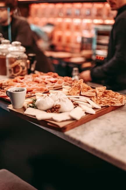 Barcelona: Tipsy Tapas & History Tour in the Gothic Quarter - First stop: classic tapas in a tucked-away bar