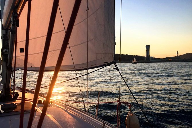 Barcelona Unique Sunset Sailing Experience with Tapas & Open Bar - Passing Platja de la Nova Icaria