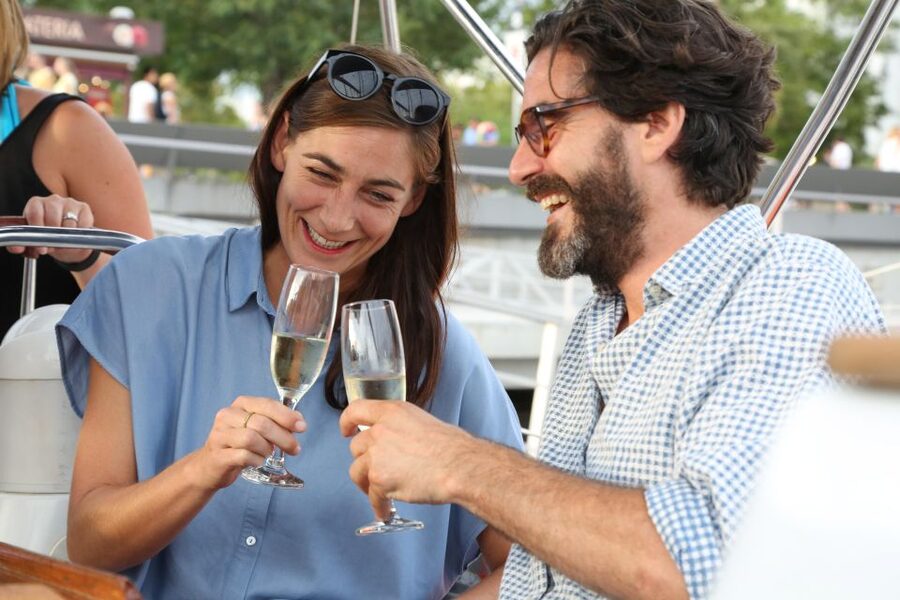 Barcelona: Unique Sunset Sailing Tour with Tapas & Open Bar - Leaving Port Olímpic as Barcelona cools down