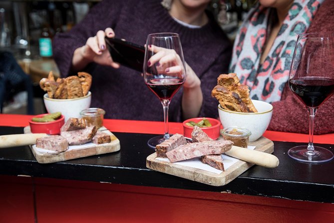 Barcelona Wine and Gourmet Tapas Tour - Walking through L’Antiga Esquerra de l’Eixample