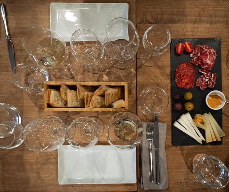 Barcelona: Wine Tasting and Tapas 5-Course Pairing Dinner - Warm appetizers and regional flavors