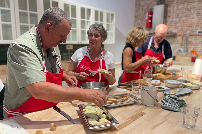 Basque Pintxos and Tapas Cooking Class in Bilbao - Building La Gilda with olives, peppers, and anchovies