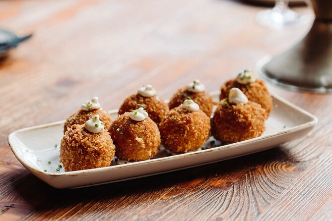 Bohemian Barcelona Neighborhood Evening Tapas & Wine Tour - What the $126.28 price really covers