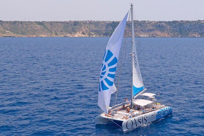 Catamaran sailing at sunset with tapas Palma de Mallorca - Weather, cancellations, and useful planning details