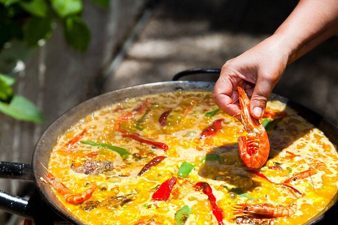 Cook Paella & Tapas + Market Tour in Barcelona (4-Course Meal) - Spanish tortilla with onions and potatoes