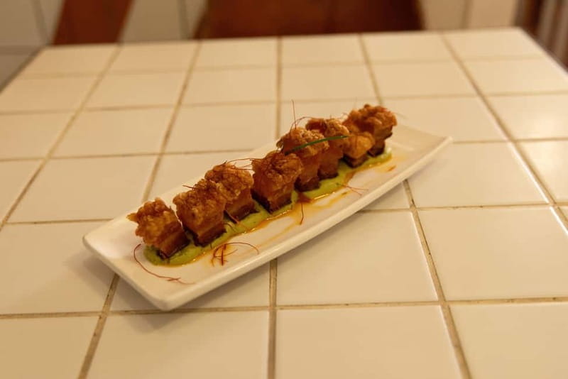 Gourmet Tapas: Local Tasting Menu at a Hidden Restaurant in Barcelona - Choosing your main course at La Cholita