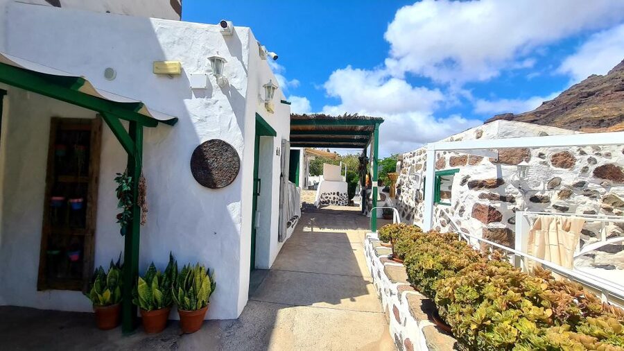 Gran Canaria: Spanish Tapas and Wine Tasting Tour in Mogan - Walking through a two-century-old Canarian farmhouse
