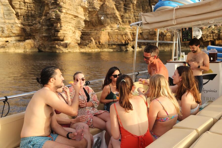 Ibiza: Scenic Sunset Cruise with Tapas and Drinks - Sunset near Caló des Moro and Punta Galera
