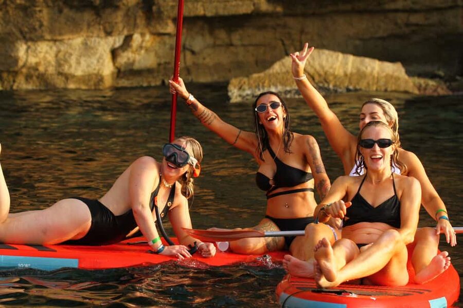 Ibiza: Sunset Boat Tour with Water Sports, Open Bar & Tapas - Cala Bassa: food, drinks, and time in the water