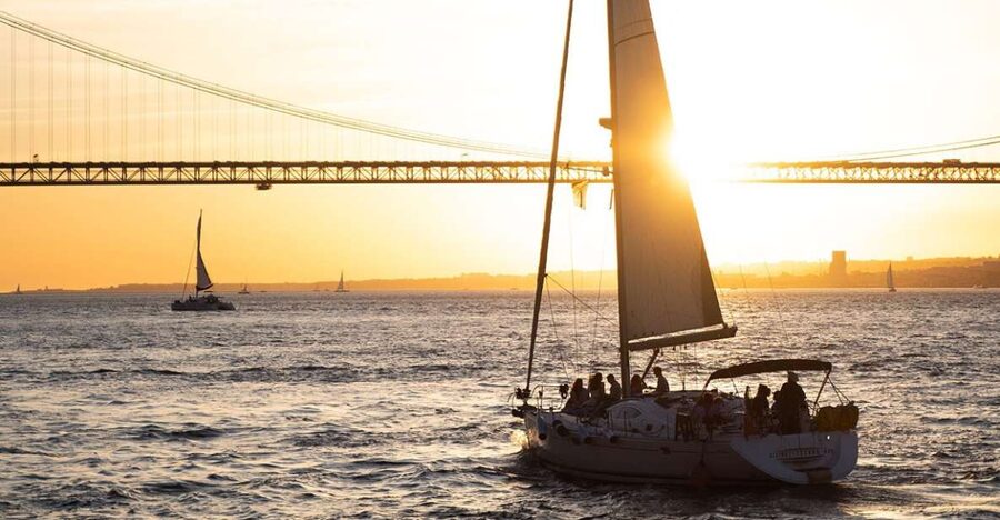 Lisbon: Alfama Charms, Tapas, Wine and Sunset Boat Cruise - Walking through Alfama’s old streets