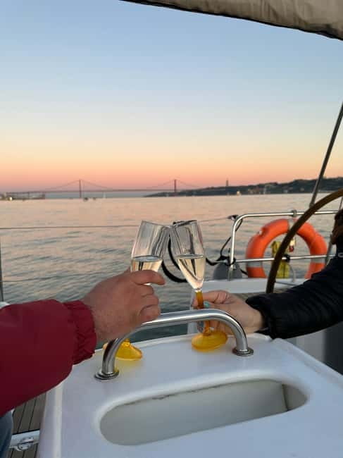 Lisbon: Romantic Cruise with Wine & Portuguese Tapas - From MAAT to LX Factory