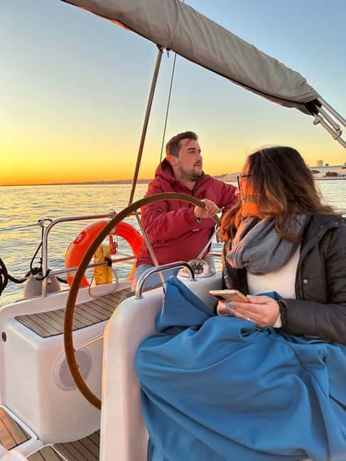 Lisbon: Romantic Cruise with Wine & Portuguese Tapas - Crossing the Tagus toward Cristo Rei