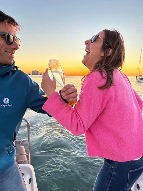 Lisbon: Romantic Cruise with Wine & Portuguese Tapas - What the crew adds to the evening