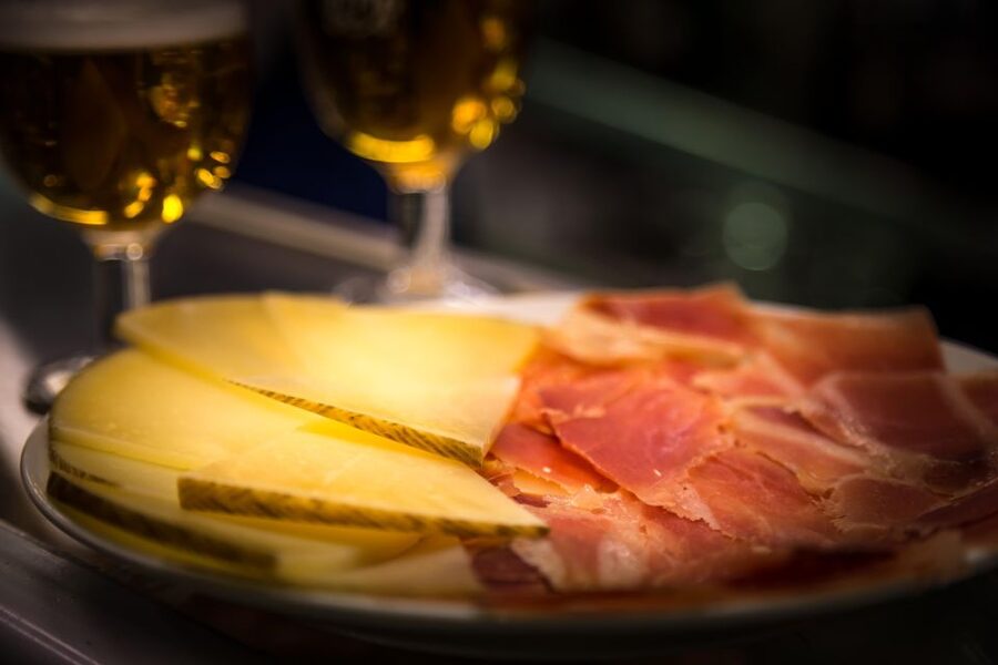 Madrid: Authentic Tapas Evening Tour with a side of History - What tapeo means in practice
