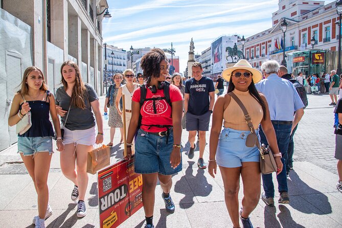 Madrid Essential Walking Tour – With Pintxo & Refreshing Drink - Calle del Arenal, churros, and San Ginés
