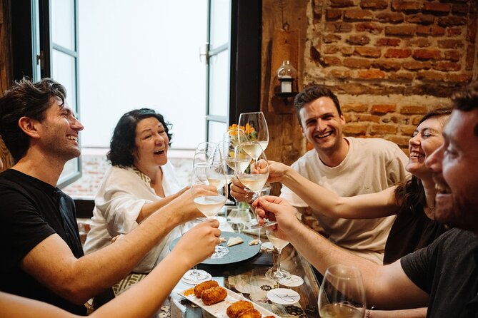 Madrid Evening Tapas and Wine Guided Tour - La Osita and the Porrón Challenge
