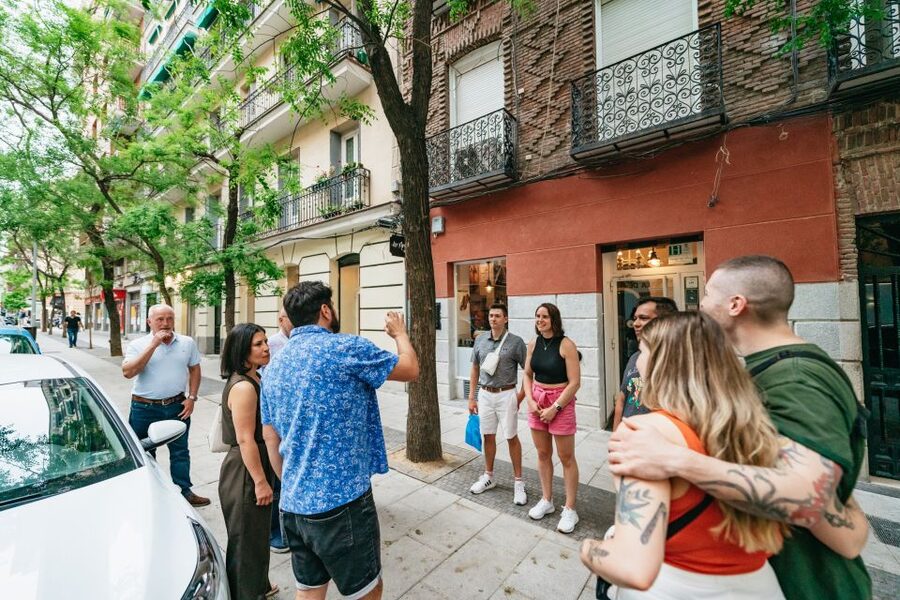 Madrid: Food & Wine Tour with 10 Tapas & 4 Drinks Included - Stop three: slow food, fresh cooking, and a fuller meal