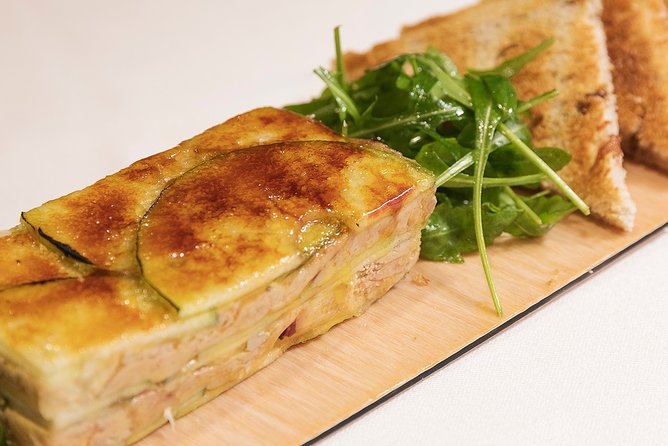 Madrid Gourmet Tapas Small Group Tour - Third venue: a local favorite with a polished edge